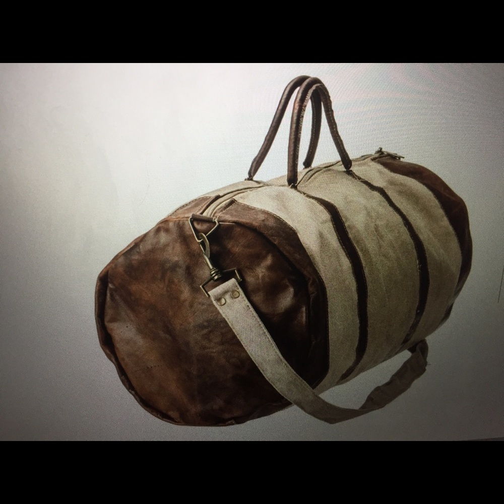 Handmade leather duffle bag.